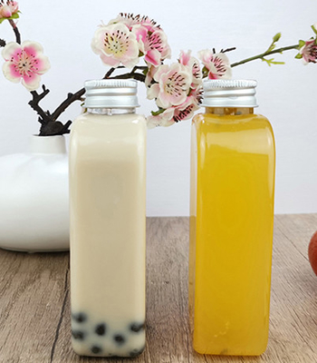 Bottiglie beventi di plastica piane di Juice Milk 400ml con il cappuccio